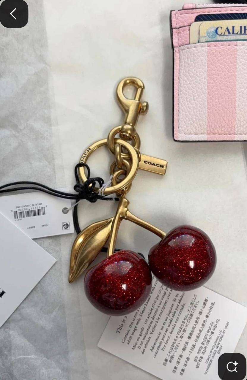 Coach cherry charm