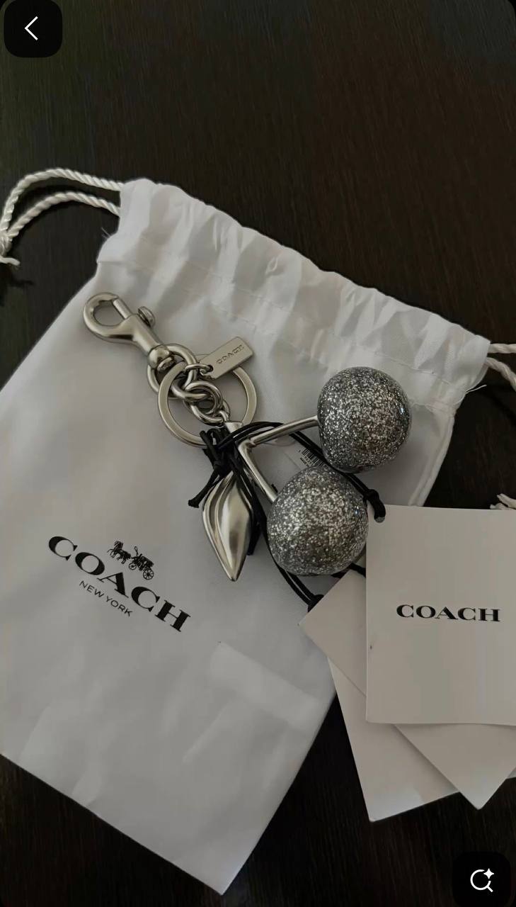 Coach cherry charm