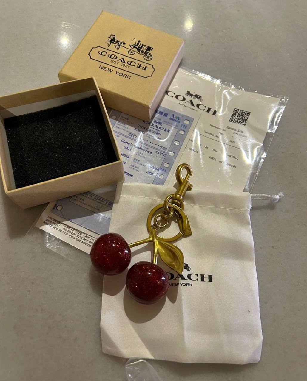 Coach cherry charm