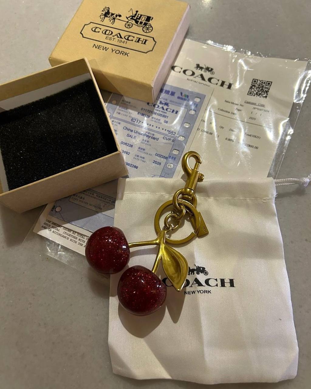 Coach cherry charm